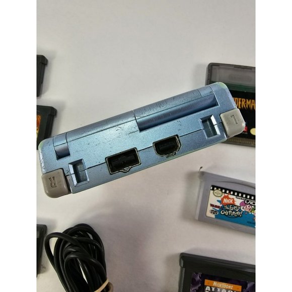 Nintendo Game Boy Advance SP Pearl Blue Bundle W/ 7 Games & Charger - Picture 7 of 10